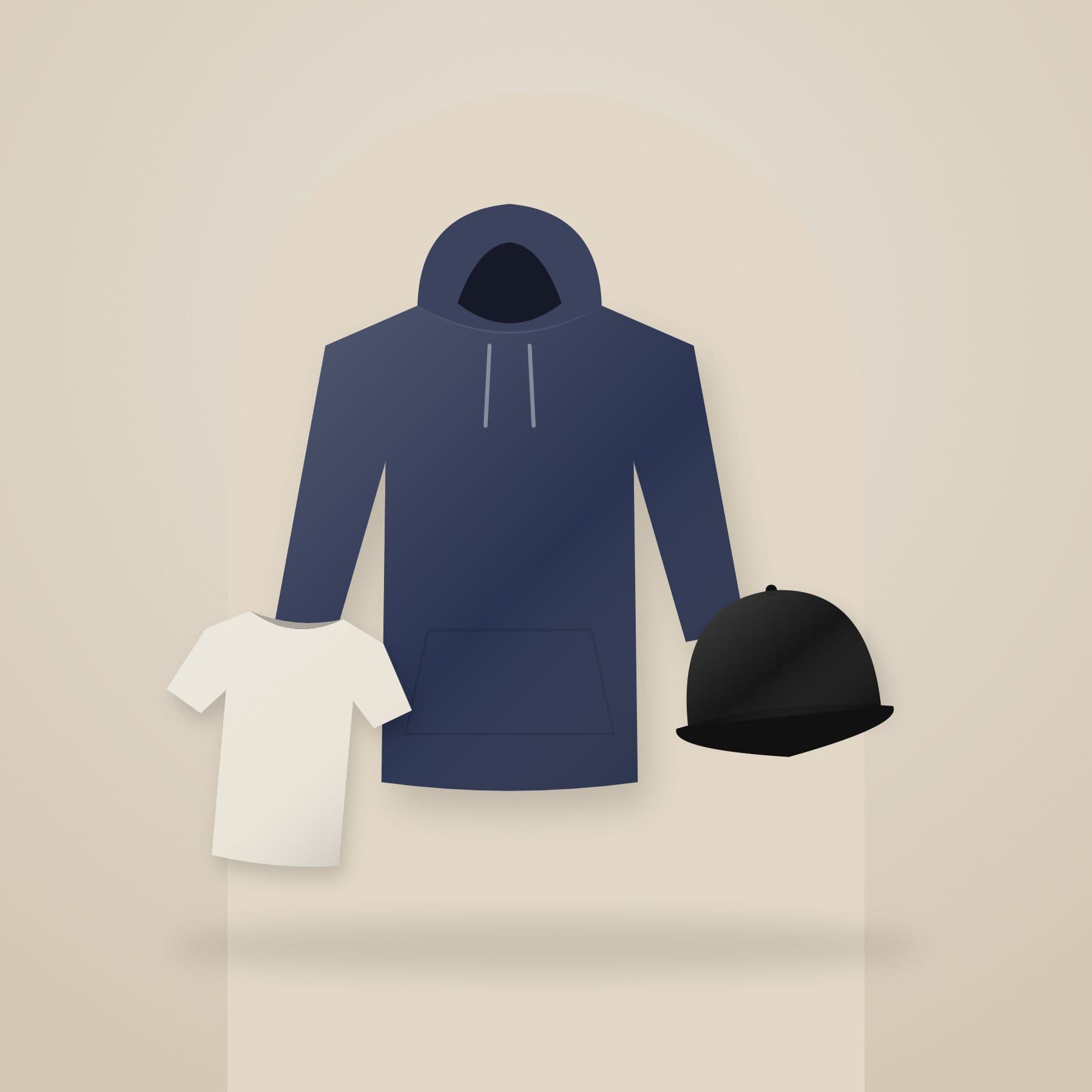 A navy hoodie, an ecru tee and a black cap arranged in front of a sand-coloured arch